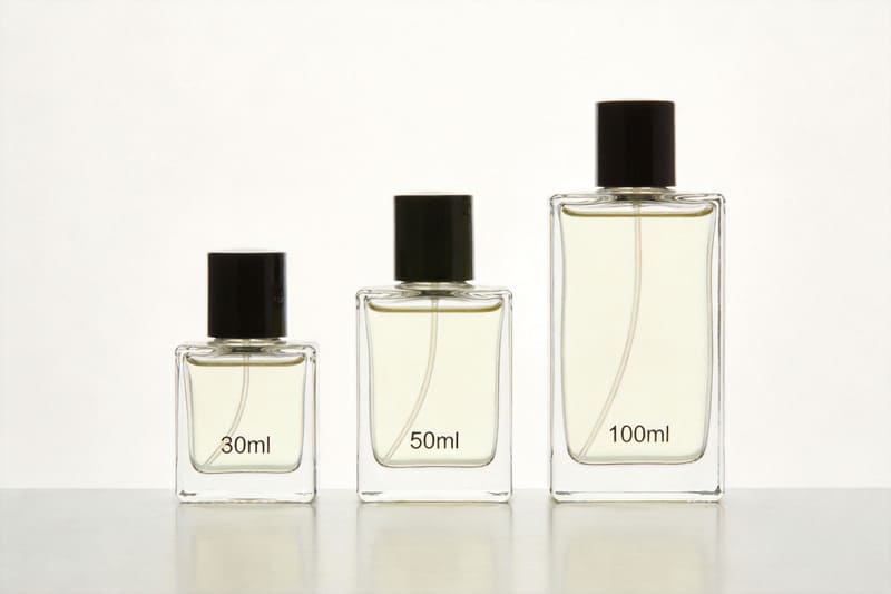 Standard Perfume Bottle Sizes A simple lineup of three perfume bottles showing 30ml, 50ml, and 100ml sizes.